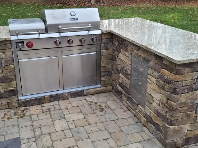 Stone veneer outdoor kitchen