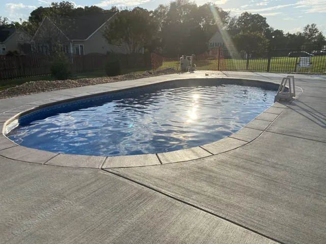 Freeform pool with a stamped deck