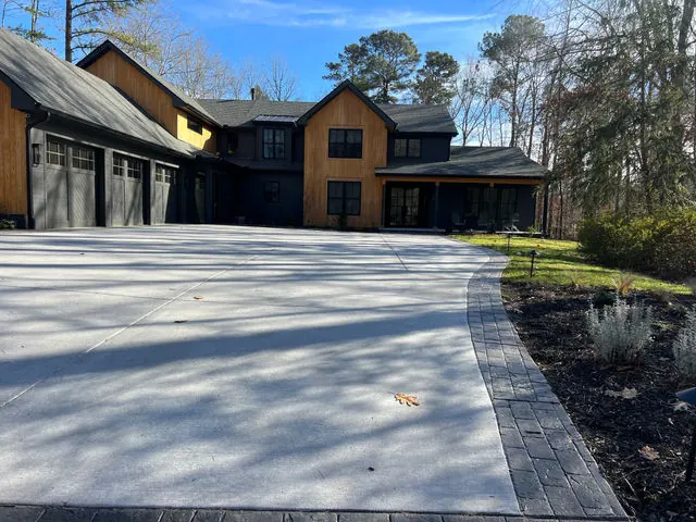 Finished concrete driveway with paver border